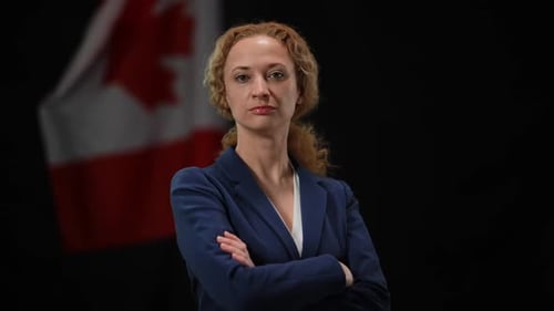 Confident Serious Canadian Politician Woman Turning to Camera Crossing Hands