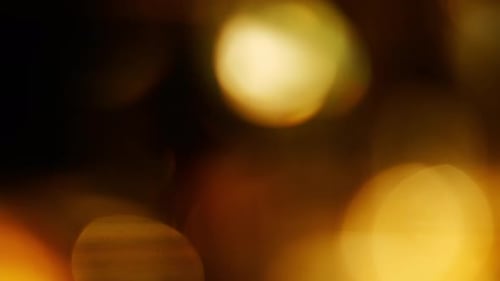 Gold Yellow Bokeh Particles Background