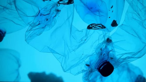 Underwater Footage of Plastic Pollution Problem Concept in Ocean