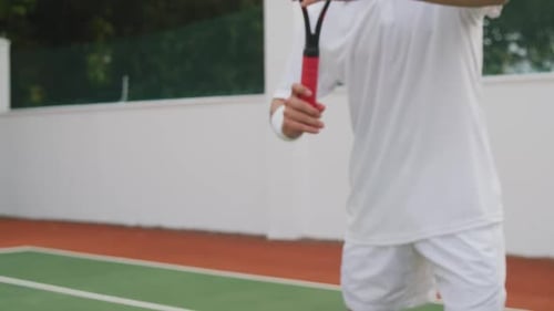Tennis players playing a point