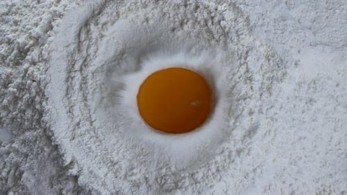 Egg Falls Into Flour