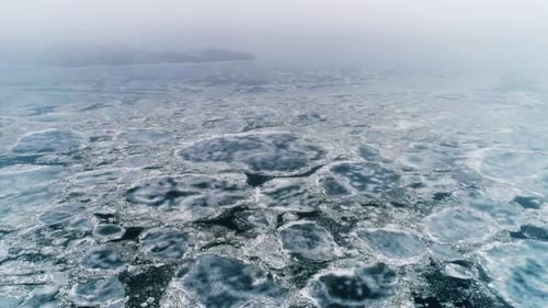 Spring Ice Drift on the River on a Cloudy Day - Drone Collection