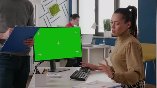 Close Up of Workmates Talking and Using Green Screen on Monitor