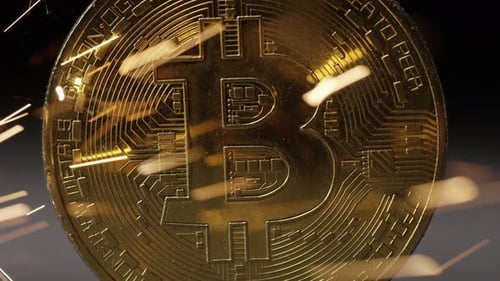 Cryptocurrency on the block chain - close up of bitcoin altcoin physical coins in dynamic setting