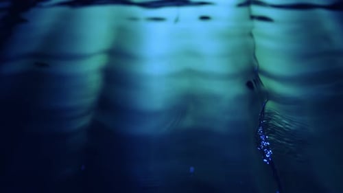 Camera follows water surface. Slow Motion.