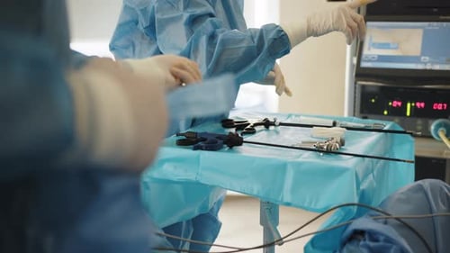 Surgeons Preparing for Operation in Hospital Room