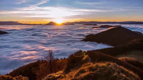 Sunrise over Mountains with Clouds