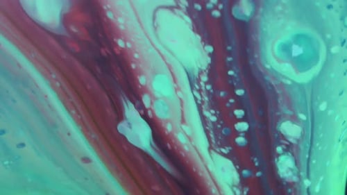 Abstract Close Up of Turquoise and Red Paint