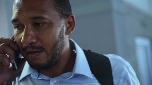 Closeup of Detective Talking on the Phone