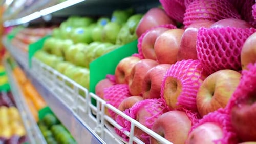 Close Up of Colorful Apple Assortment on the Supermarket Shelves Vitamins Fruits Grocery Shopping