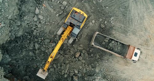 Excavator with Trucks
