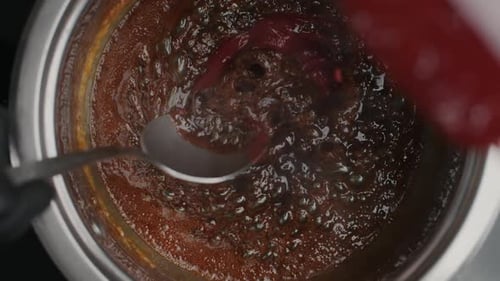 Adding Red Sauce to Dark Cooking Liquid