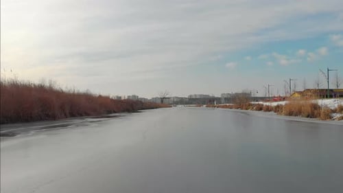 Frozen River And City