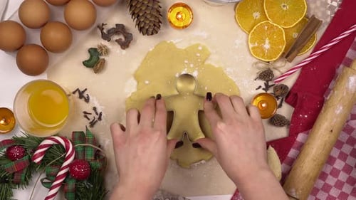 Festive Hands Making Christmas Gingerbread Cookies