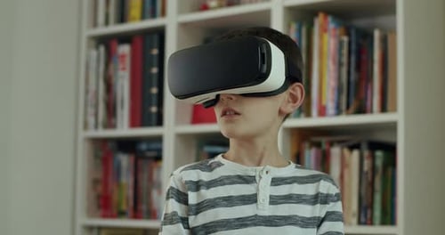 Boy Wearing Virtual Reality Headset in Home