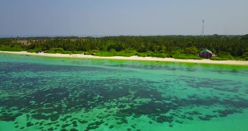 Beautiful overhead travel shot of a sunshine white sandy paradise beach and blue ocean background