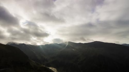Cloudy Mountain Landscape With Sunlight