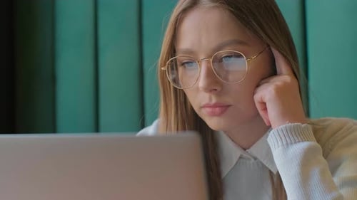 Closeup Portrait of Smiling Businesswoman Working at Modern Office and Using Computer Touchscreen