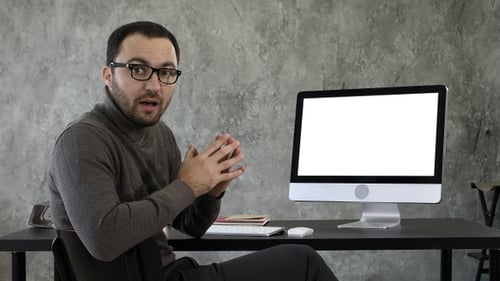 Portrait of handsome young man in casual in the office