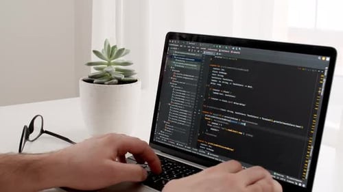 Coding on the Screen HTML Encoding and Programming on a Laptop Screen Developer Web Development