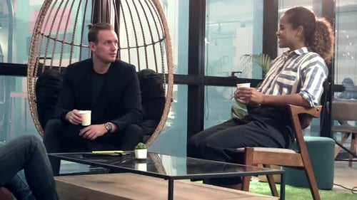 Office Worker Relax at Coffee Corner While Taking a Short Break From Work