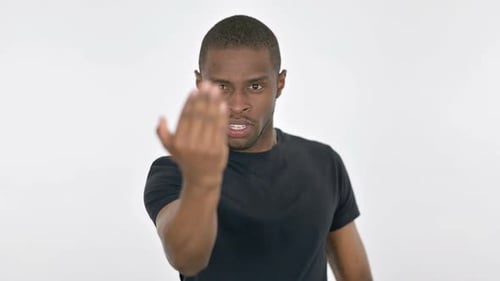 Serious Young Man Showing Fighting Stance