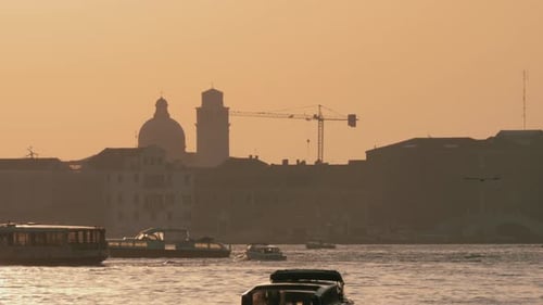 Water Transport Traffic in Venice, Italy. View at Sunset