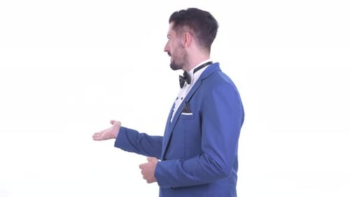 Professional Man in Blue Suit Speaks to Camera