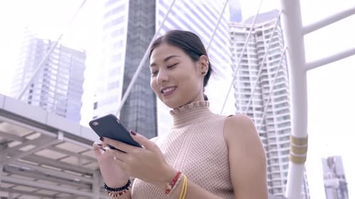 Business Woman Using Phone At Modern City