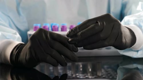 Capping Test Tube in Medical Lab Close Up