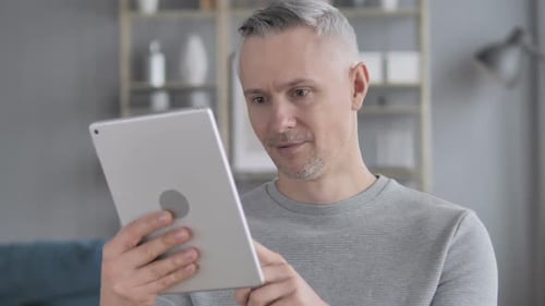 Man Reacting to Online Trading Profit
