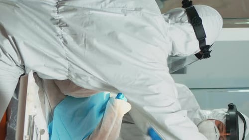Medical Worker and Patient in Exam Room