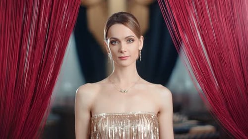 Elegant Woman in Gold Gown Posing