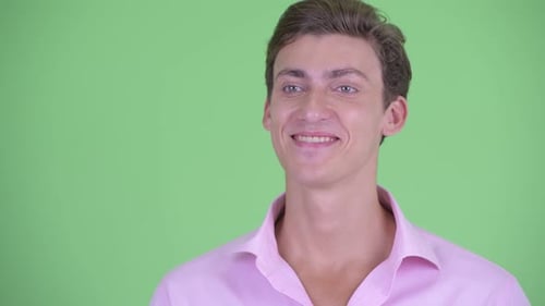 Smiling Young Man in Pink Shirt Close Up