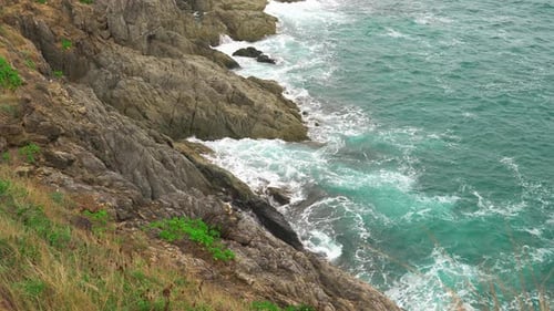 Turquoise Water on The Coast. Sea Waves Beating Against the Stone Shore. Tropical Island