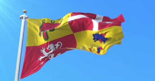 Realistic Flag Waving with Heraldic Emblems against Blue Sky
