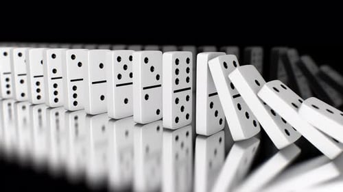 Line of Dominoes Falling Over in Slow Motion Chain Reaction Concept - 4K
