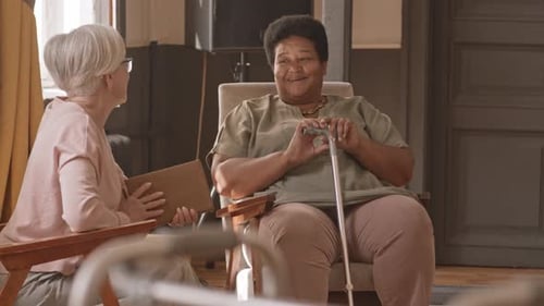 Senior Women Chatting in Nursing Home