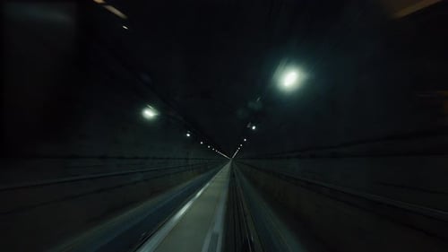 Subway Train Running Through the Tunnel