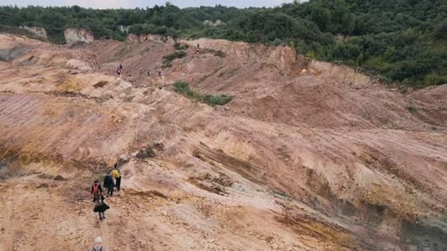 Aerial view on a large quarry area and hickers