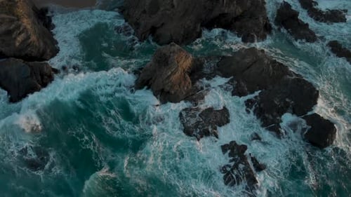Waves Hitting Rocks