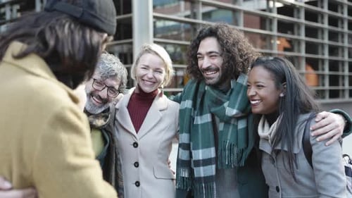 Diverse Group of Friends Laughing Together Outdoors