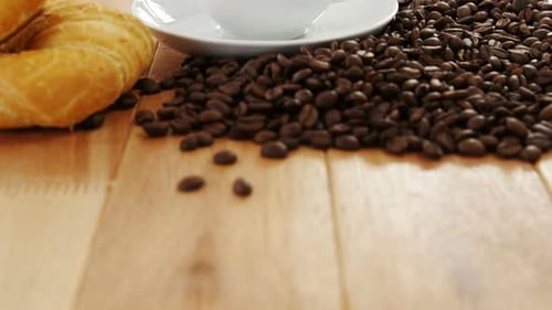 Coffee Cup Pastry and Roasted Coffee Beans