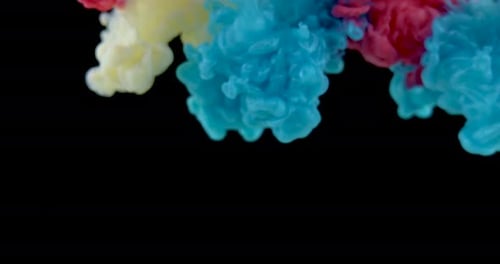 Colorful Ink Slowly Dissolving in Water