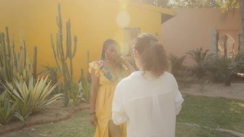Woman Posing for Photoshoot with Photographer Outdoors