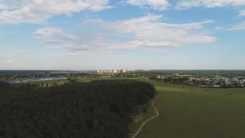 Aerial View of Wheat Fields, Meadow, Forest and Village in Rural Russia