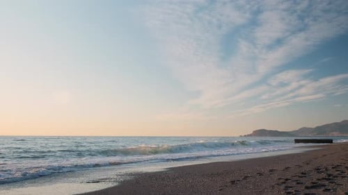 Moving clouds against beautiful sea coastline. Sky over sea, time lapse.