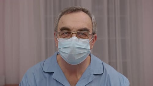 Adult Wearing Surgical Mask Indoors