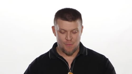 Man Enjoying a Delicious Hamburger on White Background