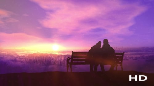 Romantic Winter Sunset Silhouette with Couple on Bench